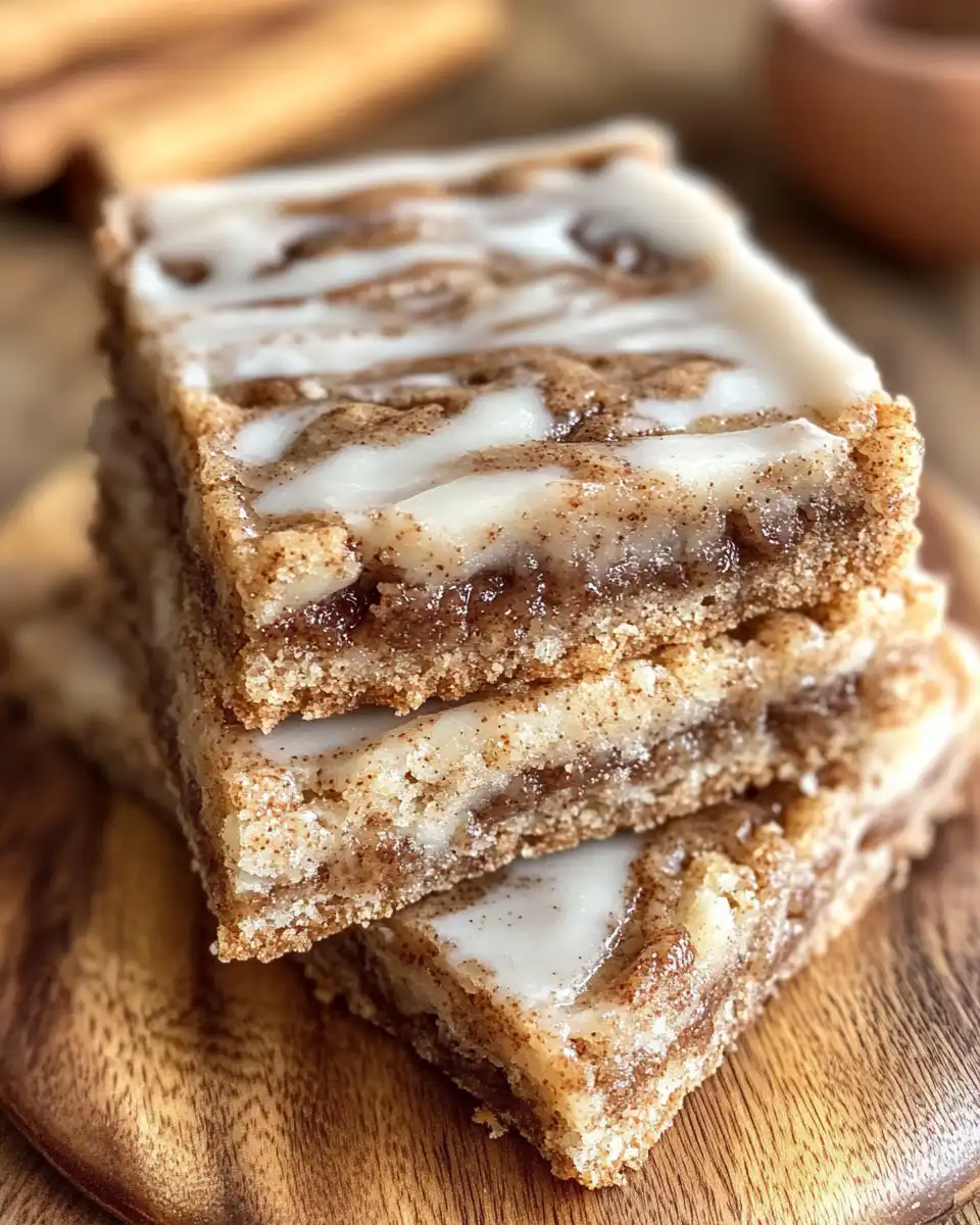 Frosted cinnamon roll bliss bars cooling on rack