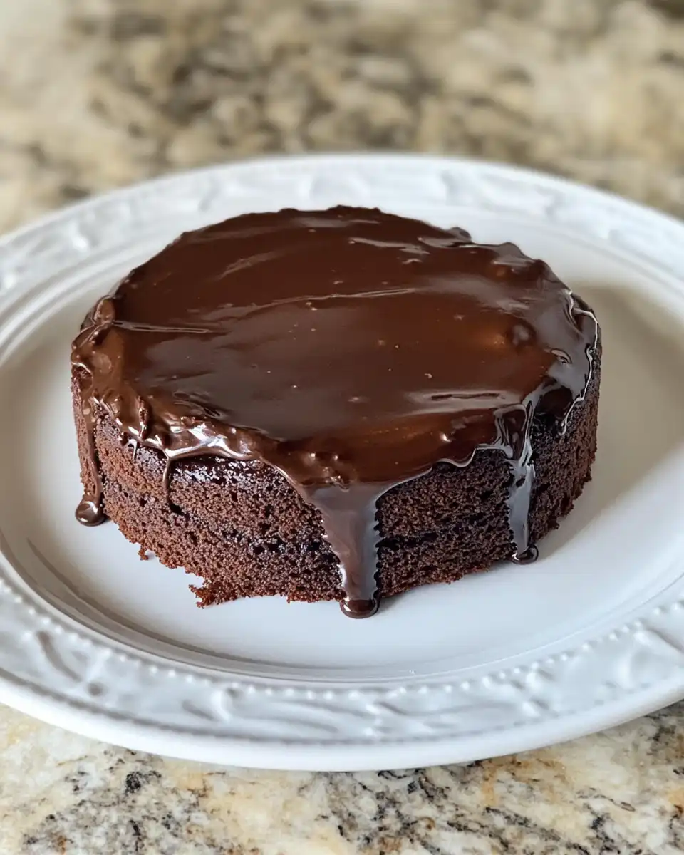 Key ingredients for chocolate fudge cake with flour, sugar, cocoa powder