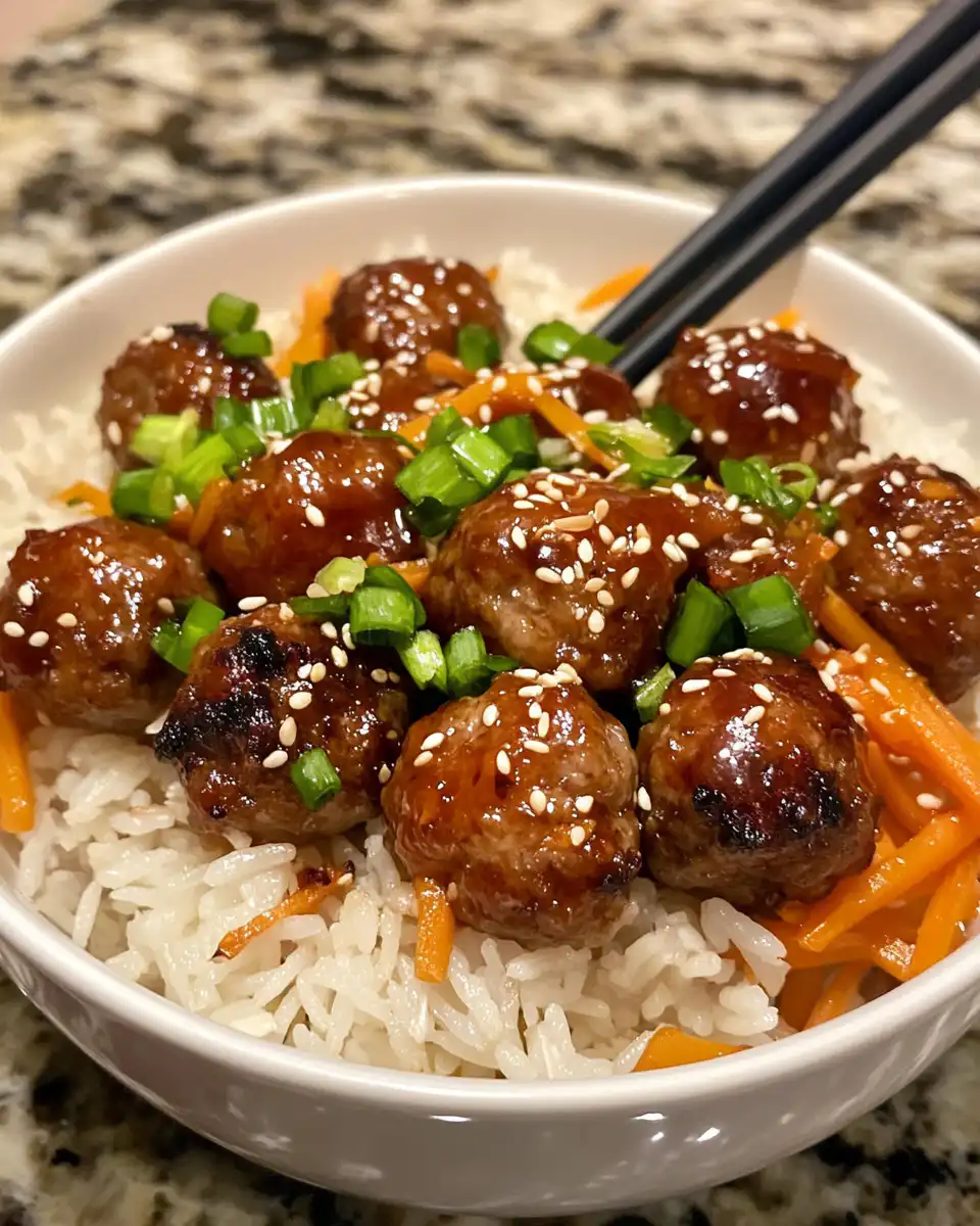 Finished Korean BBQ meatball rice bowls with garnish