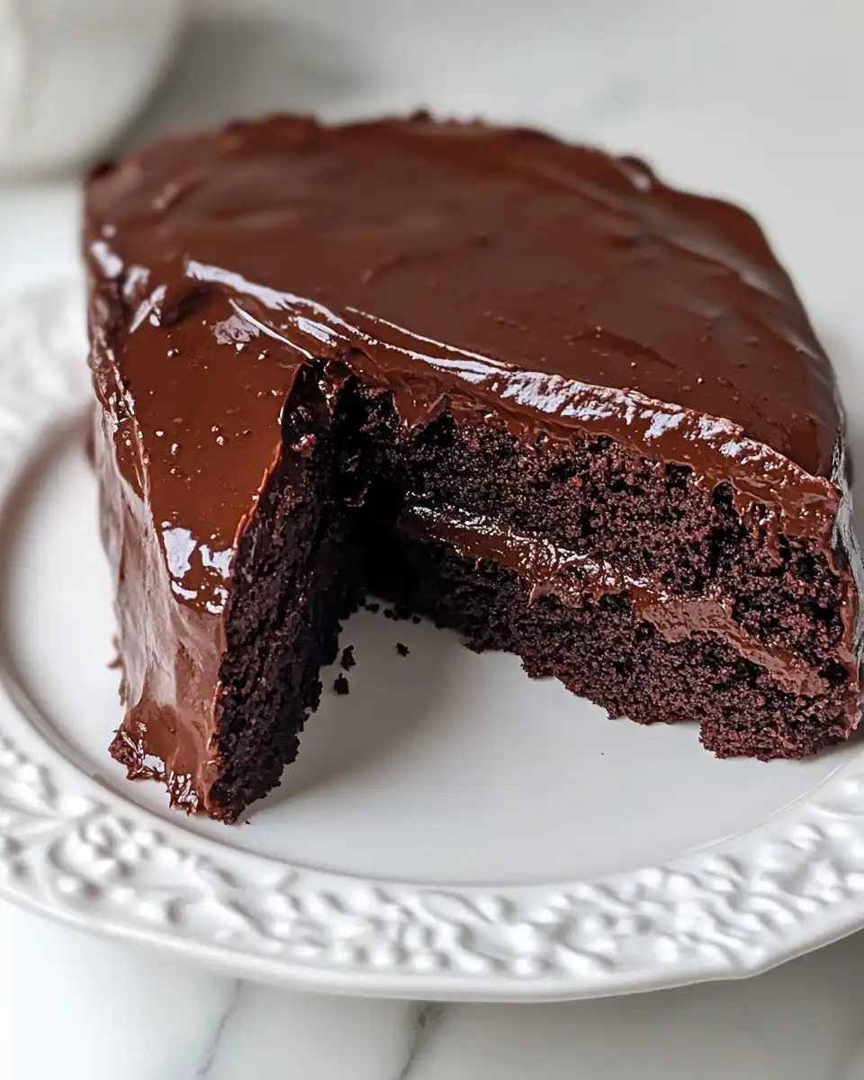 Ingredients for rich chocolate cake including flour, cocoa, eggs and sugars